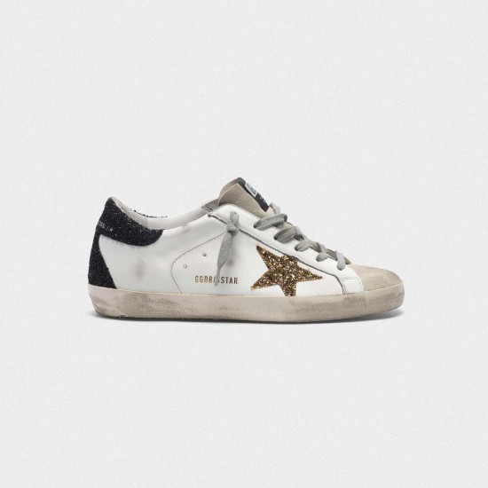 Women Golden Goose superstar with gold star and glittery black sneaker