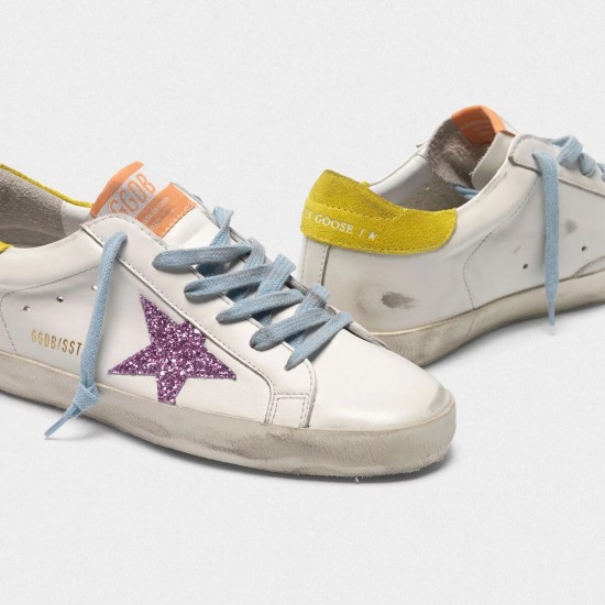 Women Golden Goose superstar with pink glittery star and yellow sneaker
